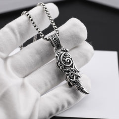 Vintage feather crown skull necklace