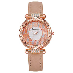 Korean-style quartz watch with a simple leather strap.