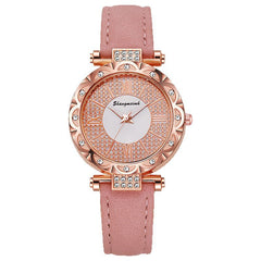 Korean-style quartz watch with a simple leather strap.