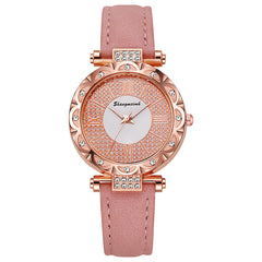 Korean-style quartz watch with a simple leather strap.