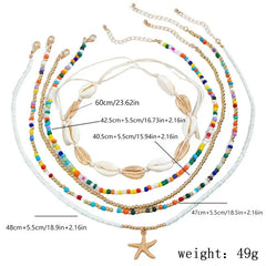 Bohemian multi-layered shell and rice bead necklace